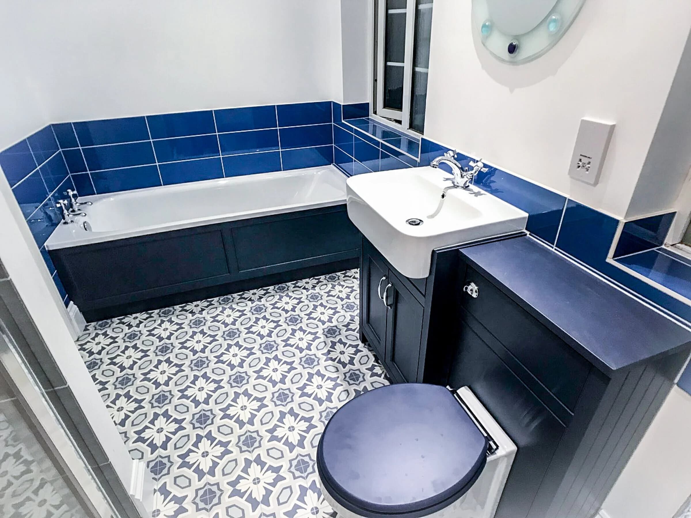 Custom blue tile bathroom renovation